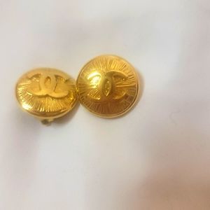 CHANEL Vintage  1inch gold metal clip on button earrings.